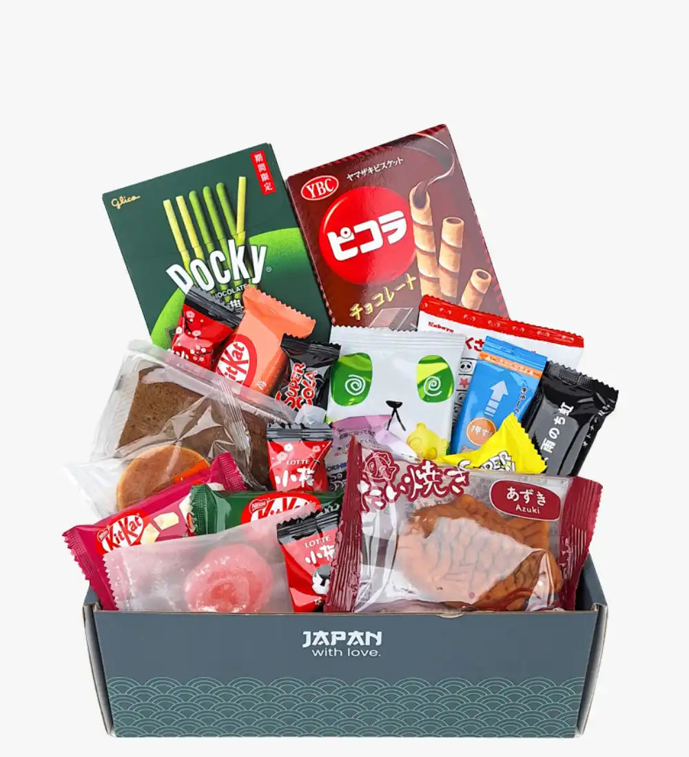 Boîte de Pocky verte et blanche avec enrobage de chocolat, bâtonnets croustillants et design classique de snack japonais.
